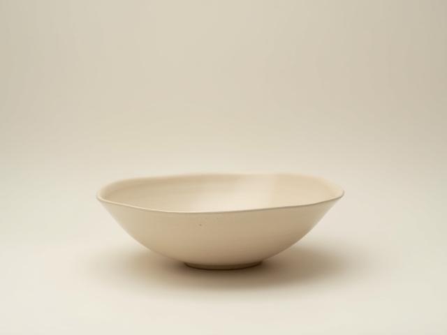 Handmade ceramic bowl in warm muted tone