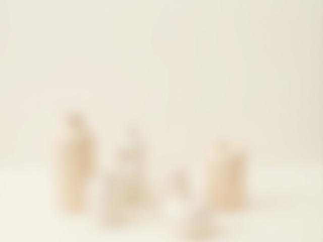 Collection of minimalist ceramic vases in varying heights